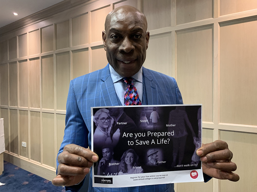 Frank Bruno holding CSALS poster